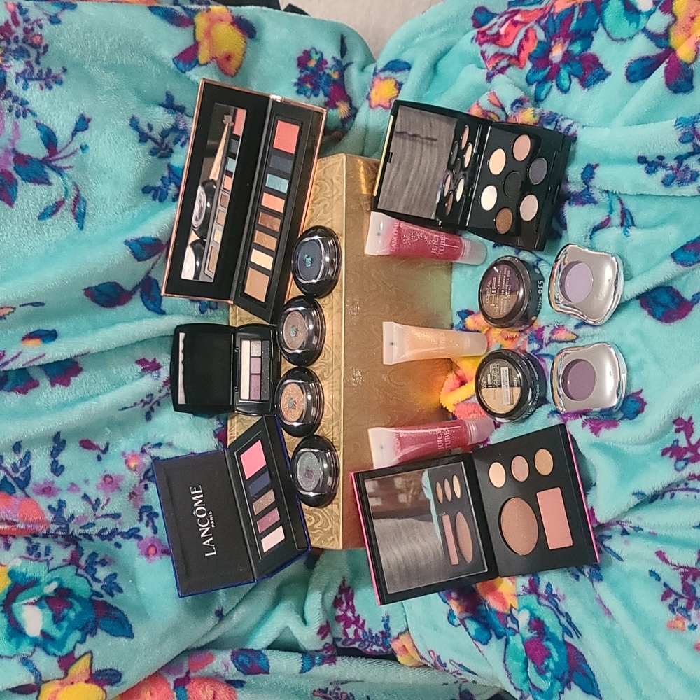 Lancome palettes, juicy tubes, Biotherm and hip loreal shadows